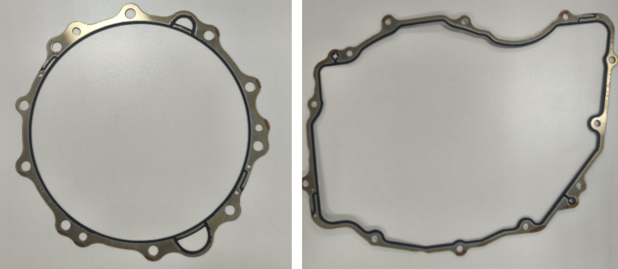 Rubber-to-metal bonded gasket: multiple visually similar variants share the same inspection station, requiring AI to differentiate between normal material variation and actual defects.